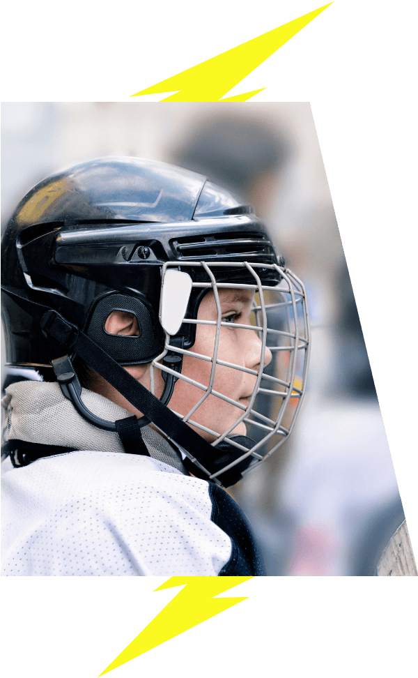 Kids hockey player with lightning bolt image accent VI Storm Athletics