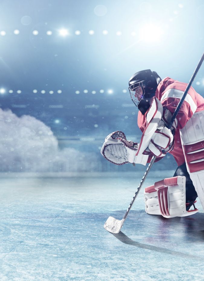 Goaltender on the ice with clouds and rink in the background VI Storm Athletics